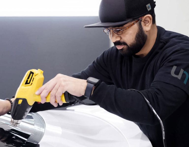 Removing car window tint in Corona